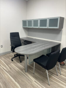 HON desk in sterling ash, frosted hutch, executive and guest chairs
