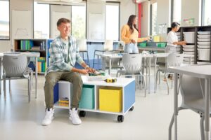 classroom desks with seating and storage